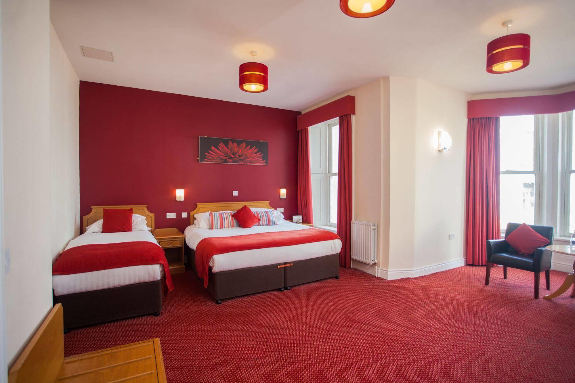 Отель Portrush Adelphi Экстерьер фото A room at the hotel